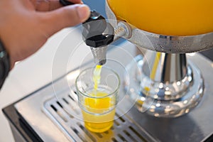 Orange juice in water cooler