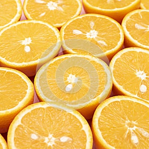 Orange juicy oranges are divided in half