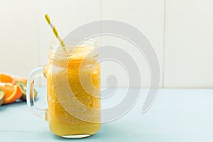 Orange juicy smoothie, summer background