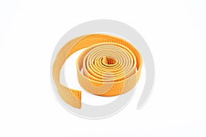 Orange karate belt on white background photo