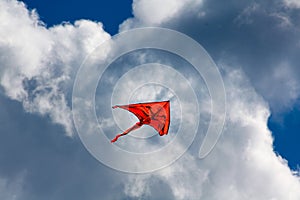 Orange kite in the sky