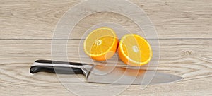 Orange with knife