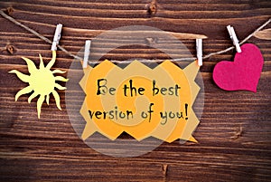 Orange Lable Saying Be The Best Version Of You photo