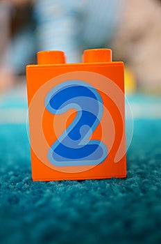 Orange Lego Duplo block