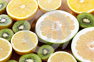 Orange, lemon citrus fruit healthy food and kiwi