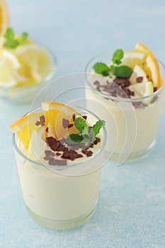 Orange lemon citrus milk mousse in glasses