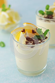 Orange lemon citrus milk mousse in glasses