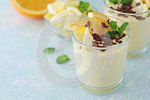 Orange lemon citrus milk mousse in glasses