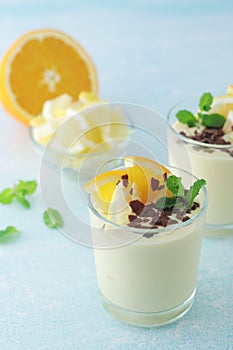 Orange lemon citrus milk mousse in glasses