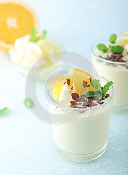 Orange lemon citrus milk mousse in glasses