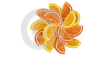 Orange and lemon jelly slices on white background