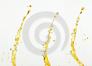 Orange, lemon juice or oil lubricant splash, liquid gold yellow drink drops. Fruit beverage water elements in line form . Fresh