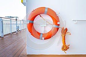 Orange life buoy device on ship/ boat/ yacht