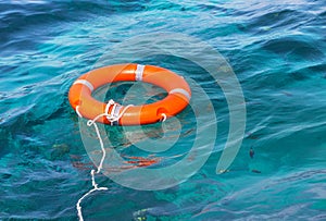 Orange life buoy safety equipment