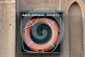 Orange life preserver in Bath Humane Society holder