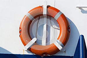 Orange Lifebuoy on a Ferry Boat