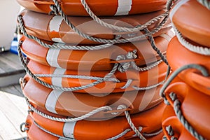 Orange lifebuoys on a pleasure boat