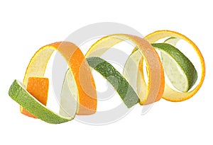 Orange and lime zest isolated on white background. Fresh citrus fruit peel