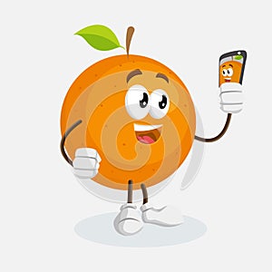 Orange Logo mascot with selfie pose