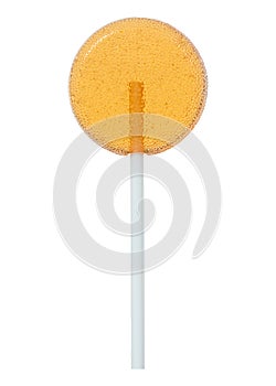 Orange lollipop isolated on white