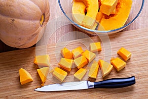 Orange pumpkin cut into pieces