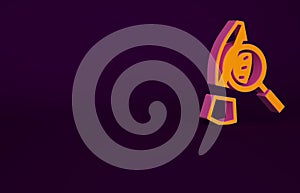 Orange Magnifying glass with footsteps icon isolated on purple background. Detective is investigating. To follow in the