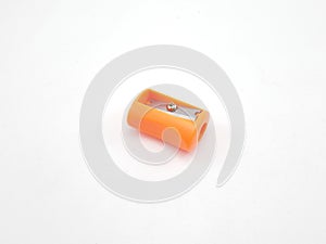 Orange manual hand operated pencil sharpener