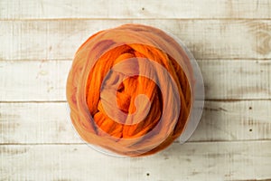 Orange merino wool ball