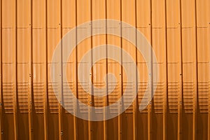 orange metal sheet pattern and vertical line design photo