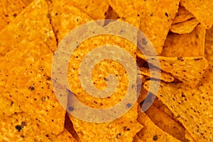 orange mexican nachos chips on plate