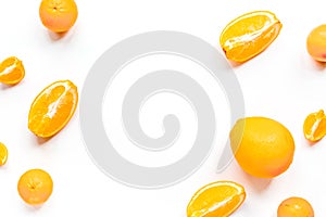 Orange with mint on white background top view mock-up