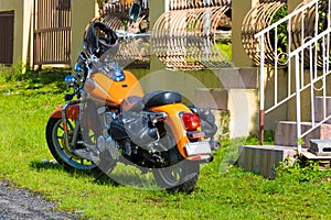 Orange motorcycle with bags