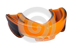 Orange mouthguard for boxing and other martial arts, on a white background