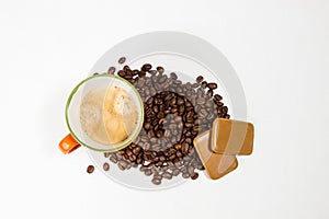 Orange mug with coffee beans and cookies 02