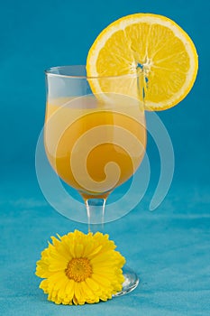 Orange nectar on blue