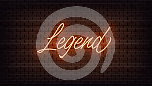 Orange neon Legend, lettering. Neon text of Legend on black brick background