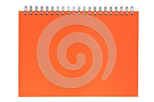 Orange notebook on a spring