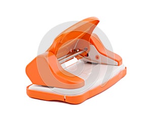 Orange office paper hole puncher, isolated on white