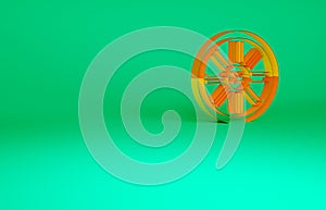 Orange Old wooden wheel icon isolated on green background. Minimalism concept. 3d illustration 3D render