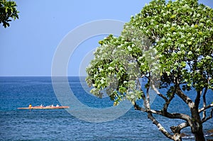 Orange outrigger in waters near the north end of Kaunaoa beach