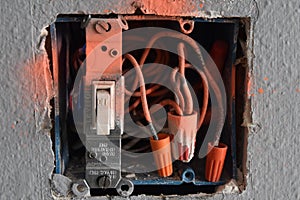 Orange painted electrical switch box