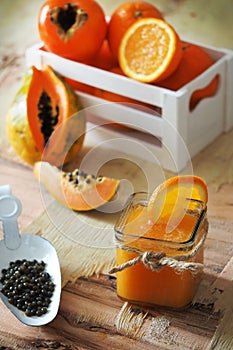 Orange, papaya and kaky juice