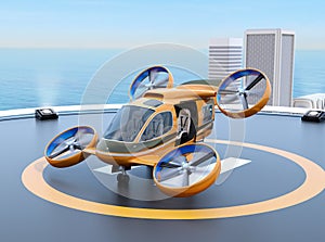 Orange Passenger Drone Taxi takeoff from helipad on the roof of a skyscraper photo