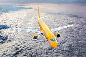 Orange passenger plane in flight.