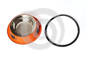 An orange pet bowl with stopper removed and placed side by side white backdrop photo