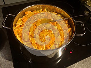 Orange pieces in pot