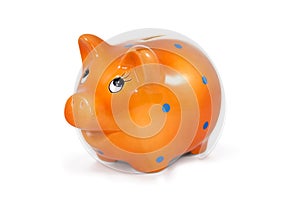 Orange piggy bank isolated on white