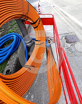 Orange pipe for laying the optical fibers to connect companies a photo