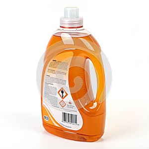 Orange plastic bottle for liquid laundry detergent isolated on white