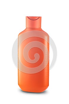 Orange plastic bottle with shampoo. isolated on white background